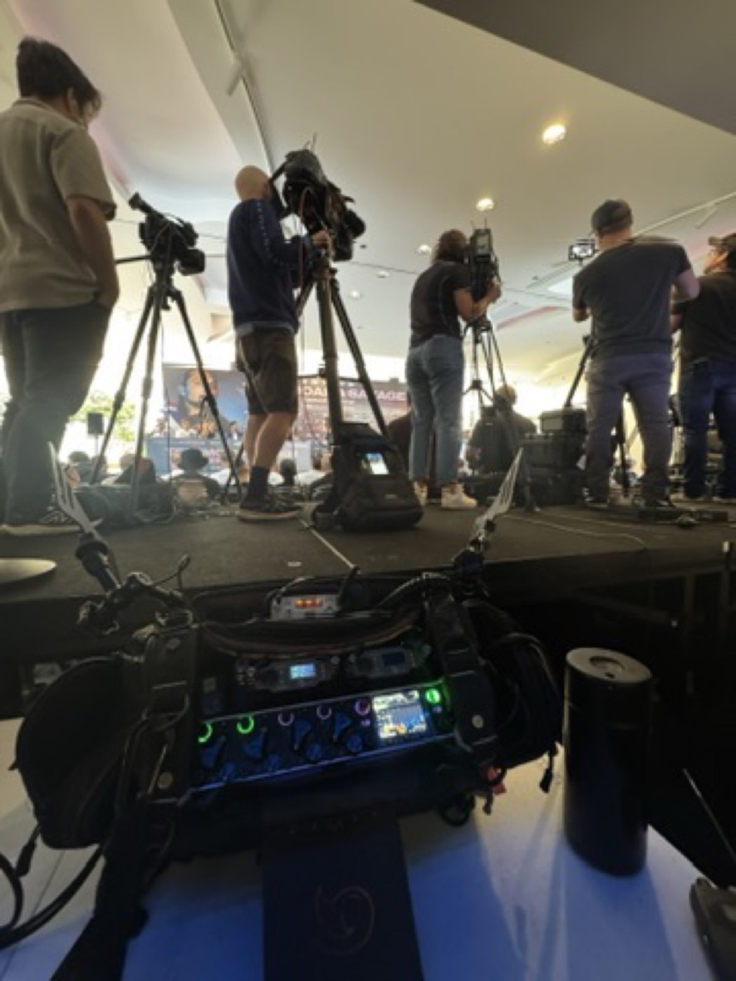 Sound recorder in front of a stage event on the Gold Coast