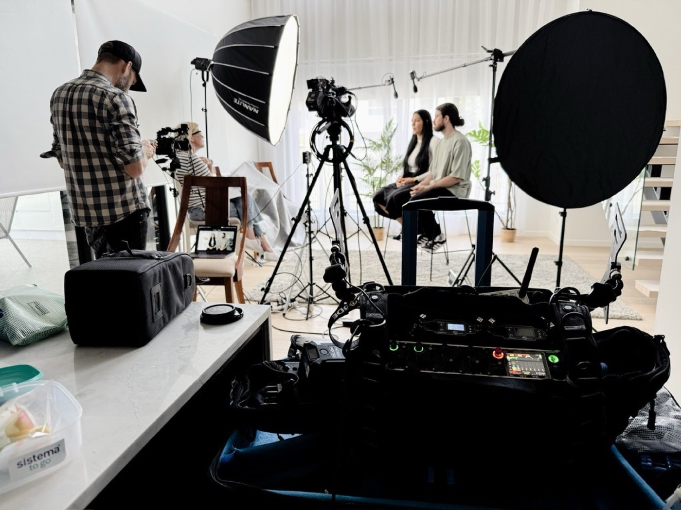 Two-person interview set with lights and sound kit in a bright Brisbane studio